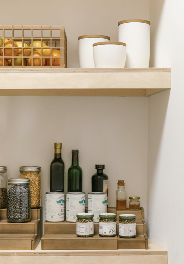 Marie Kondo organized kitchen cabinets.